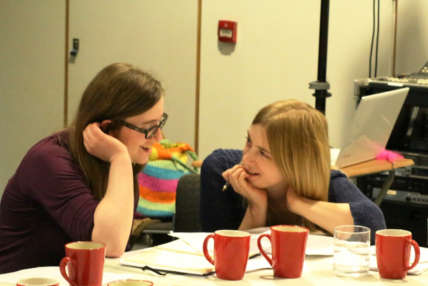 Image of two participants in conversation