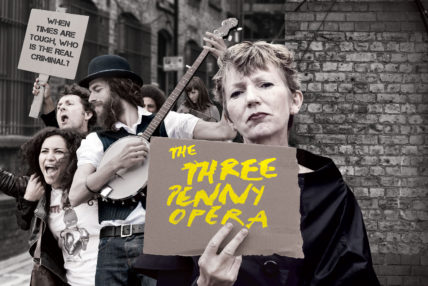 Image of woman holding placard saying 'The Threepenny Opera'