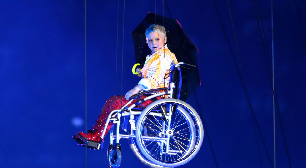Image of Nicola Miles-Wildin in the air at the Paralympics opening ceremony